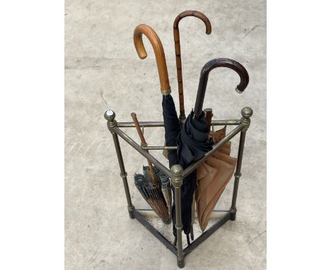 A VINTAGE BRASS CORNER UMBRELLA/STICK STAND WITH DRIP TRAY AND AN ASSORTMENT OF UMBRELLAS TO INCLUDE BURBERRY