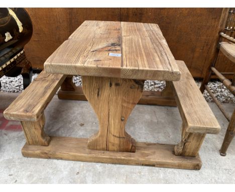 A PINE CHILDS GARDEN TABLE WITH ATTACHED BENCH