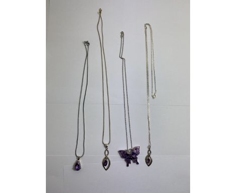 FOUR MARKED SILVER NECKLACES WITH AMETHYST PENDANTS