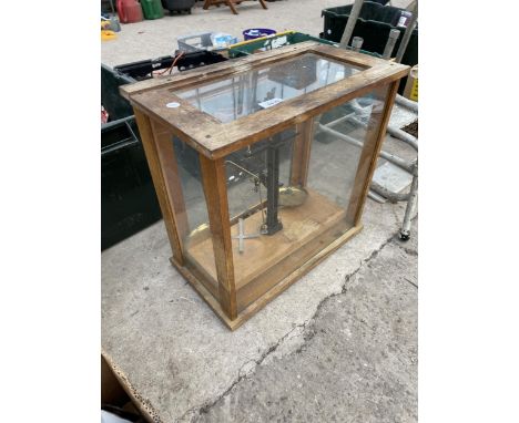 A SET OF VINTAGE WOODEN CASED BALANCE SCALES