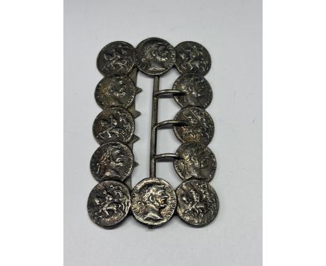 A BUCKLE MADE OF VINTAGE COINS