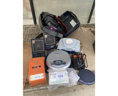 AN ASSORTMENT OF ITEMS TO INCLUDE WALKMEN AND A CAMERA ETC