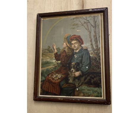 A FRAMED VINTAGE PRINT OF A GIRL AND BOY WITH A DOG
