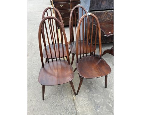 A SET OF FOUR ERCOL BLUE LABEL WINDSOR STYLE CHAIRS