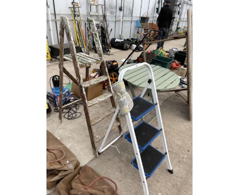 A NON SLIP THREE RUNG STEP LADDER AND A FURTHER VINTAGE WOODEN LADDER