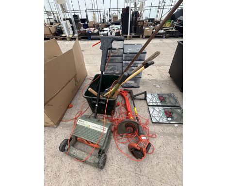 AN ASSORTMENT OF TOOLS AND HARDWARE TO INCLUDE FLYMO ELECTRIC STRIMMERS AND A LAWN RAKE ETC
