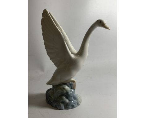 A NAO FIGURE OF A FLYING SWAN