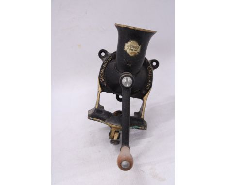 A VINTAGE SPONG CO LTD BLACK AND GOLD CAST IRON COFFEE GRINDER