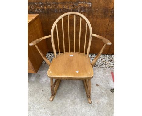 AN ERCOL BLUE LABEL CHILDS ROCKING CHAIR