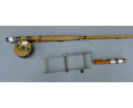A vintage fly fishing rod and reel, and vintage line winder. 
