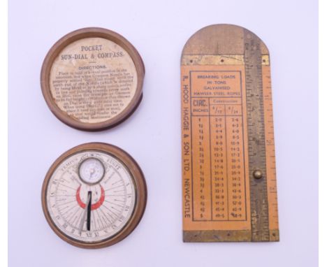 A vintage wood cased pocket sundial and compass, A W Gamage Ltd, Holborn, and a brass and wood measure for breaking loads of 