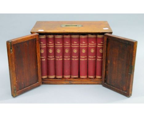 A cased set of Harmsworth Encyclopedia housed a mahogany box. 40 cms wide. 