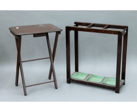 An early 20th century stick stand, a folding table and two small tripod wine tables. The former 59.5 cm wide.