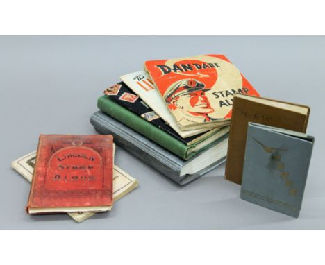 Eight various vintage stamp albums.