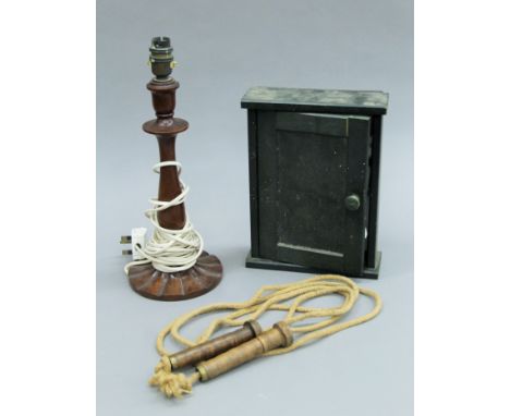 A mahogany table lamp, a key cupboard and a vintage skipping rope. The former 36.5 cms high. 
