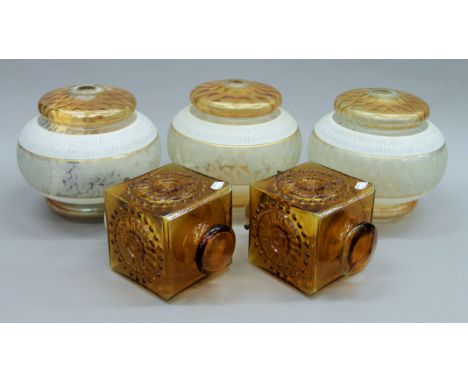 A quantity of vintage light shades.