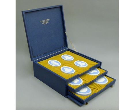 A collection of Wedgwood portrait medallions, boxed. The box 36.5 cms wide. 