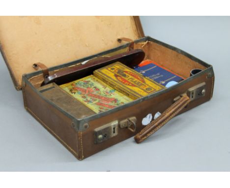 A small case containing various vintage games. 