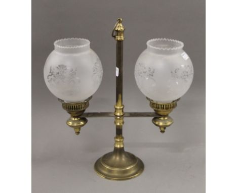 A brass twin branch table light with etched glass shades. 38.5 cms high. 