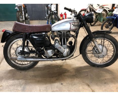 EXTRA LOT: A 1957 Norton Model 50, registration number YYA 587, silver. Our vendor informs us that the engine and gearbox hav