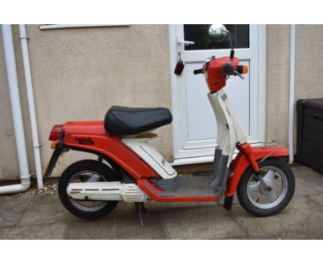 A 1987 Yamaha Passola SA50E, registration number D879 MYB, frame number 2T4 278068, engine number 2T4 278068, red. This Passo