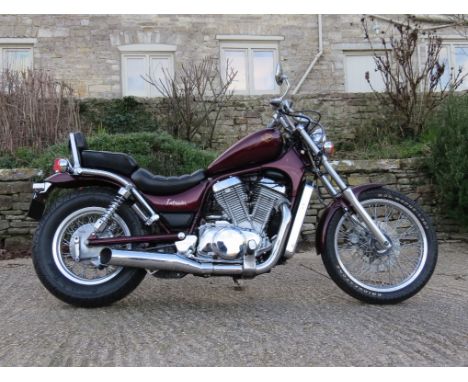 EXTRA LOT:  A 1986 Suzuki VS750 Intruder, registration number D491 FPW, maroon/black.  The cruiser styled Intruder was introd