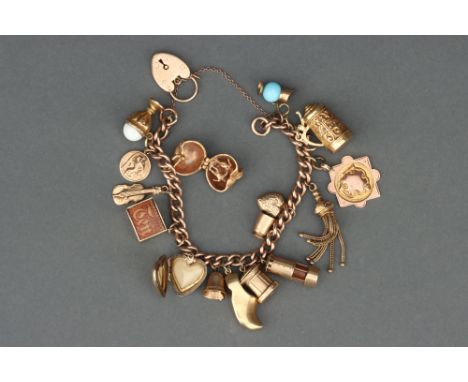 complete with 16 assorted charms including ten shilling note, miner's lamp, Adam &amp; Eve in an apple, postbox and more; mos
