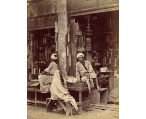 both albumen prints c.1880, a study of a glass jewellery shop in Cairo by Bechard, titled ' Marchands de Verroterie' and sign