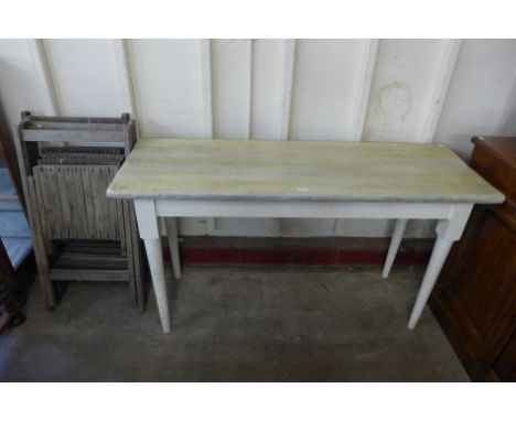 A set of four wooden folding garden chairs and a painted beech kitchen table 