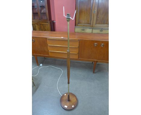 A teak standard lamp 