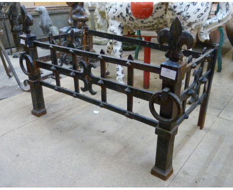 A wrought iron fire grate frame 