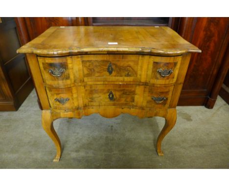 A small 19th Century Italian walnut commode 