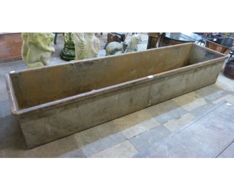 A long galvanised trough 
