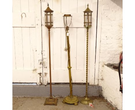 2 brass standard lamps, and a copper standard lamp, tallest 154cm (3) 