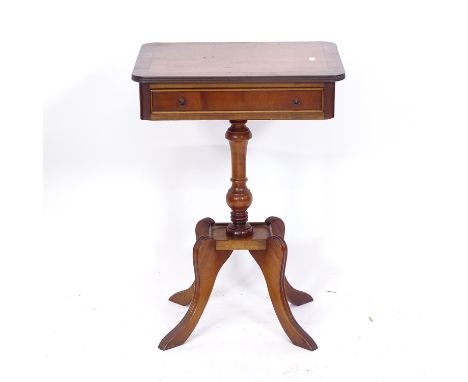 A reproduction yew wood lamp table, with single drawer, on a quadruple leg base, W42cm, H59cm, D32cm 