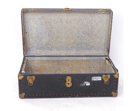 An early 20th century studded and bound ship's trunk, W91cm 