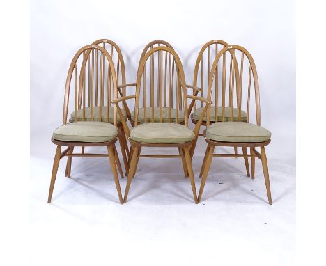 A set of 6 elm and beech stick-back Ercol dining chairs, with blue and gold label (4 and 2), and original cushions 