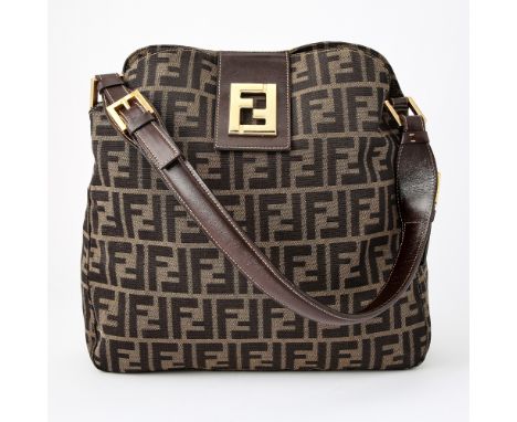 Canvas bag with logo print, brown leather shoulder strap with gold-tone hardware, signed Fendi. 12 x 11 1/2 x 4 inches.Light 