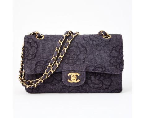 Double flap bag with gold-tone hardware, double 'CC' turn lock closure and woven-in leather chain strap, navy blue interior w