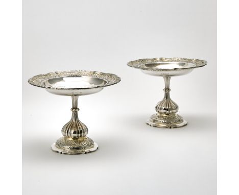 Paul Storr, London, 1834The molded notched leaf and C-scroll engraved rim enclosing a foliate strapwork and rosette trellis c