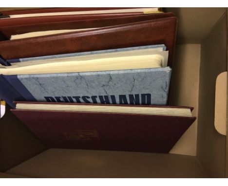 STAMPS GERMANY Box with three albums with printed pages, mint and used stamps from British, French, American and Russian Zone