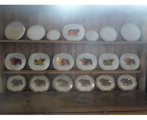 A set of seven English Ironstone Pottery Limited Beefeater plates, each having a bull decoration, together with six further s