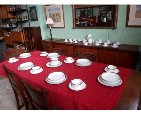 An extensive Thomas of Germany dinner service, comprising: teacups & saucers, coffee cans & saucers, teapot, coffee pot, dinn