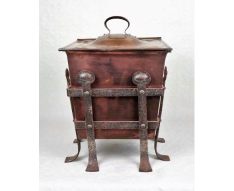 A late 19th century Arts & Crafts coal bin and stand of square form, the cover having relief Art Nouveau leaf decoration, 45c