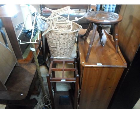 A quantity of furniture items, to include: chest of drawers, stick stand, standard lamp, stool and other items.