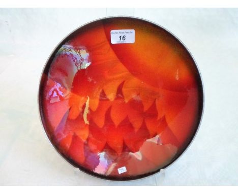 A Poole Pottery Studio limited edition dish, 'The Elements', Fire, designed by Karen R Ford, numbered 110/350, 25cm diameter,