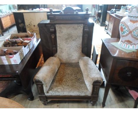 A pair of 19th century Dutch walnut armchairs of imposing proportions, having stuffed over-seats and carved architectural dec