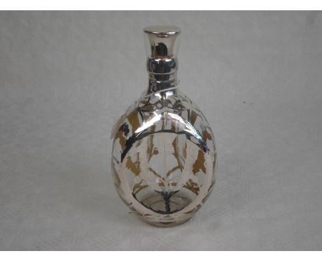 A mid to late 20th century John Haig whisky decanter (lacking contents), of shaped form with white metal mounts, 23cm.