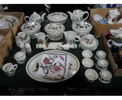 A quantity of Portmeirion Botanic Garden tableware, to include: covered tureens, a teapot, coffee pot, cups & saucers, a roll