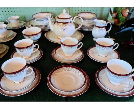 A Royal Grafton Majestic part-tea service, comprising trios, teapot, plates and other items.